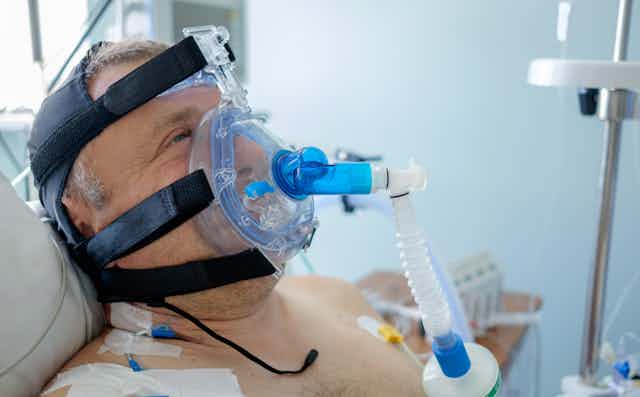 A man wearing a CPAP mask