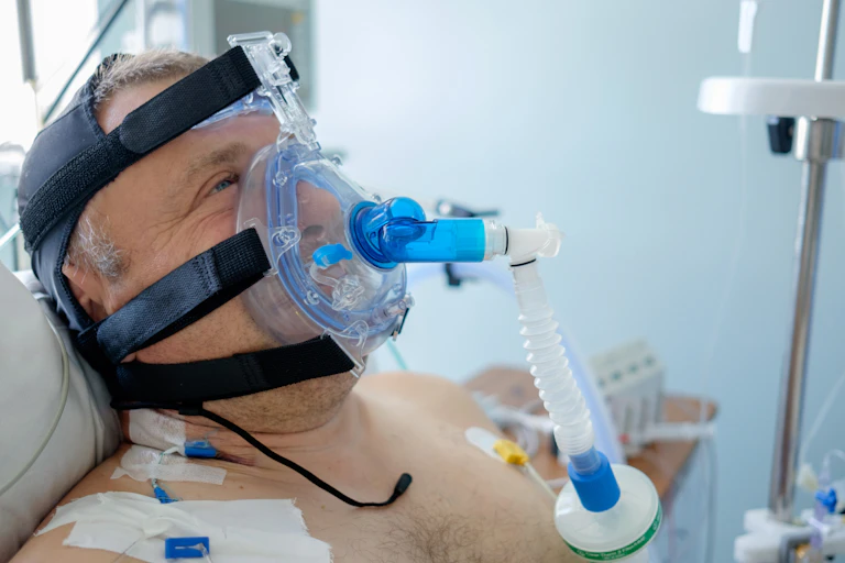 A man wearing a CPAP mask
