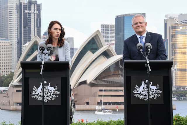 Jacinda Ardern and Scott Morrison with Sydney Opera house in background
