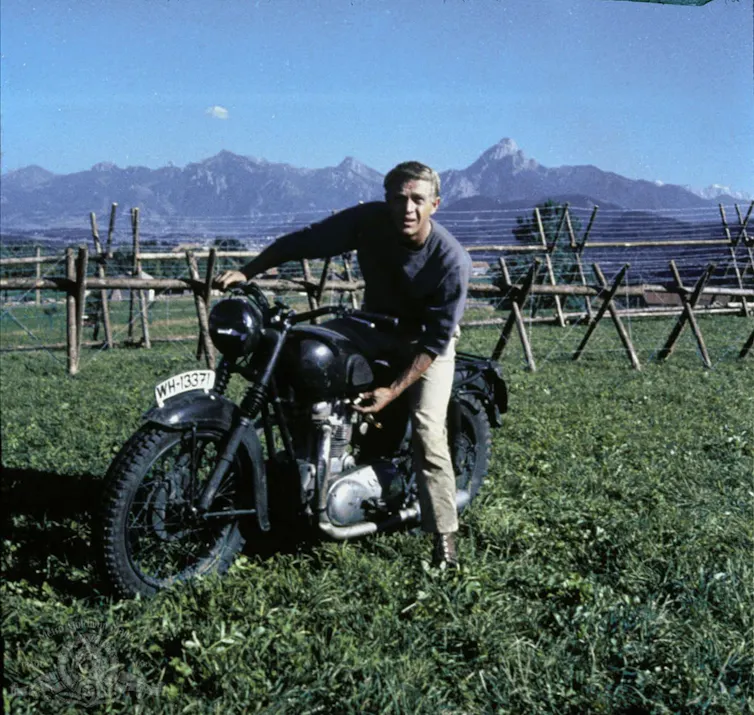 Handsome man on motorcycle from 1960s movies
