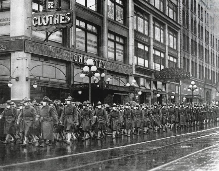 Army workers wearing masks in Seattle, USA, 1918