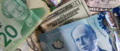 A collection of Canadian and American bills.