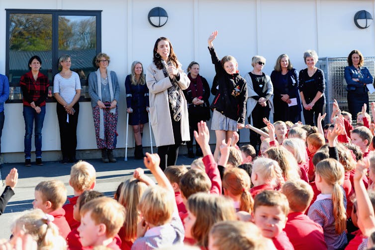 Jacinda Ardern with school children