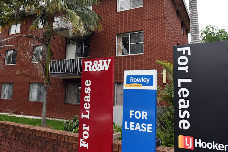 For lease signs in front of block of Sydney units