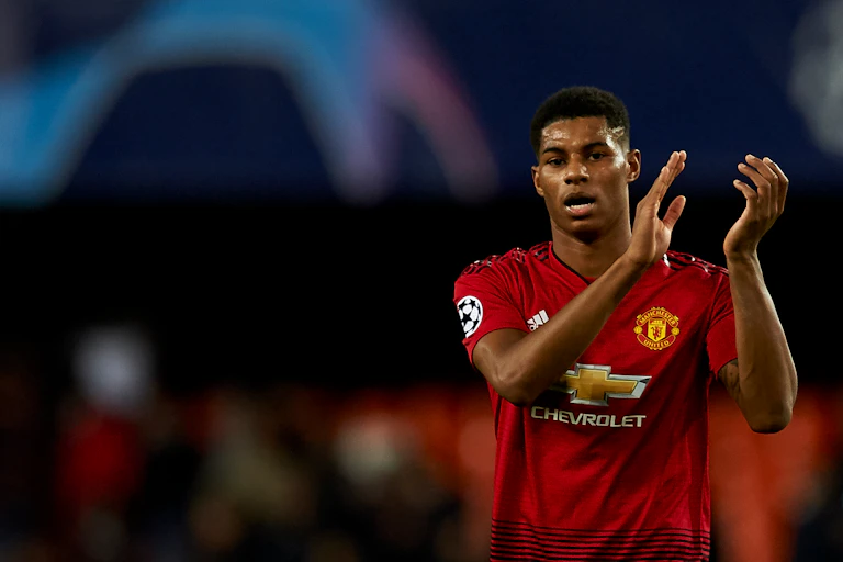 Marcus Rashford of Manchester United clapping his hands.