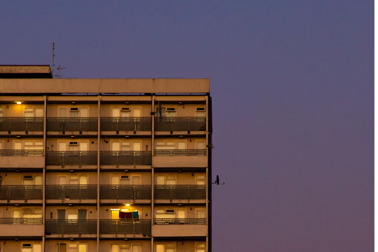 View of a tower block at dusk.