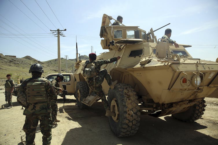 Afghan troops continue to battle a Taliban-led insurgency