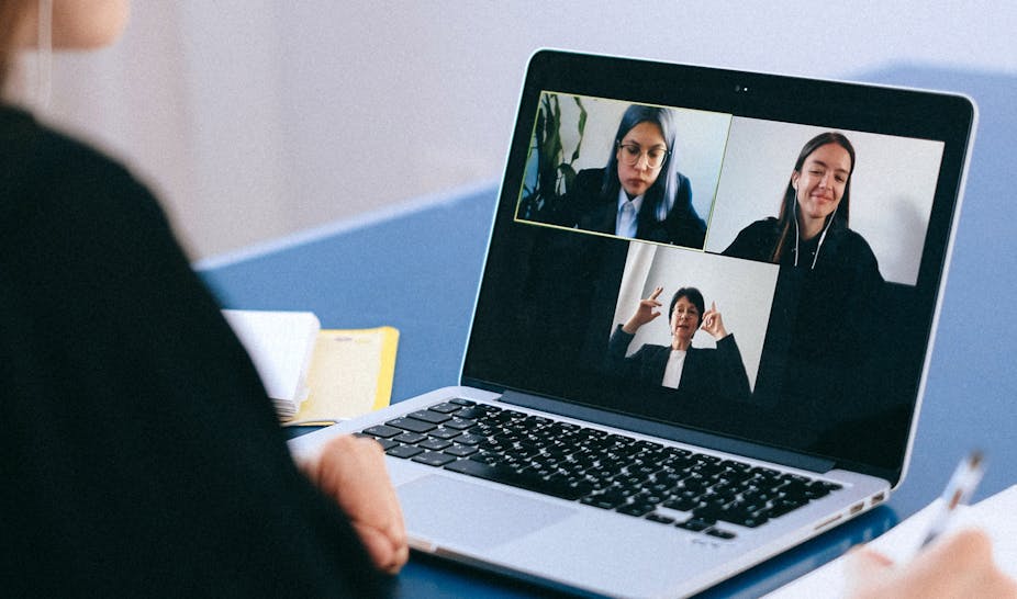 Woman using videoconferencingn software