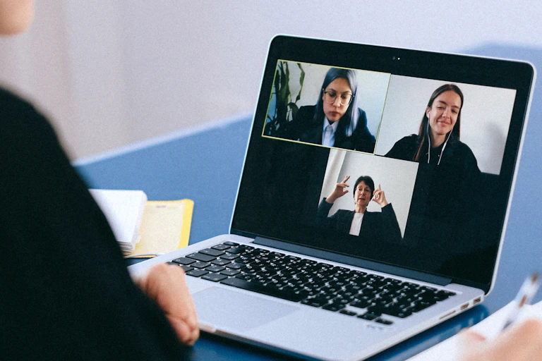 Woman using videoconferencingn software