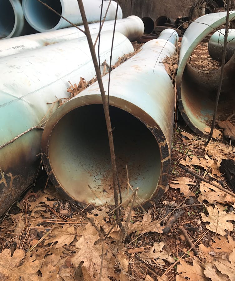 Pipes stacked up after a fire.