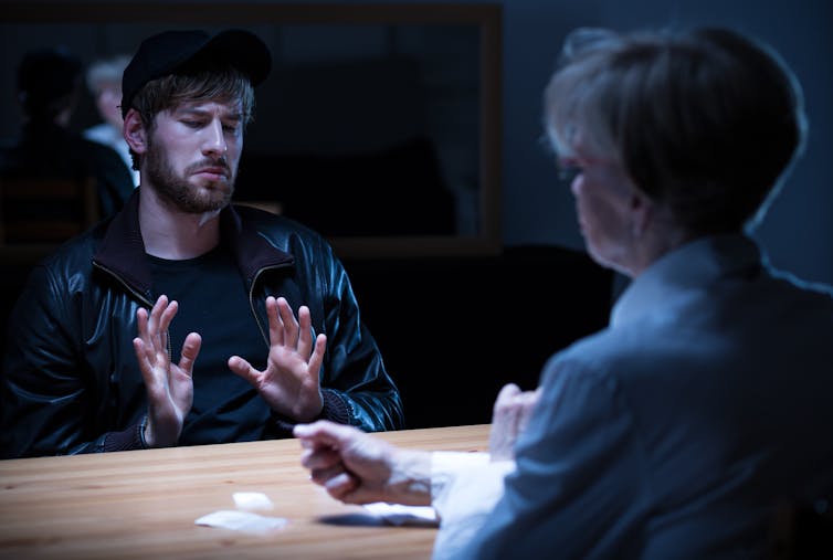 Picture of a police interrogation.