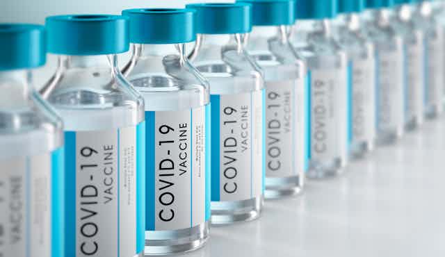 Rows of COVID vaccine bottles