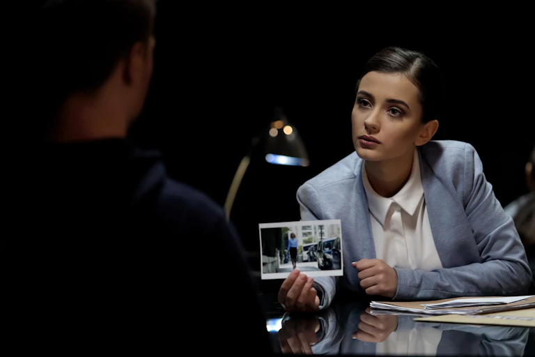 Image of a police interrogation.