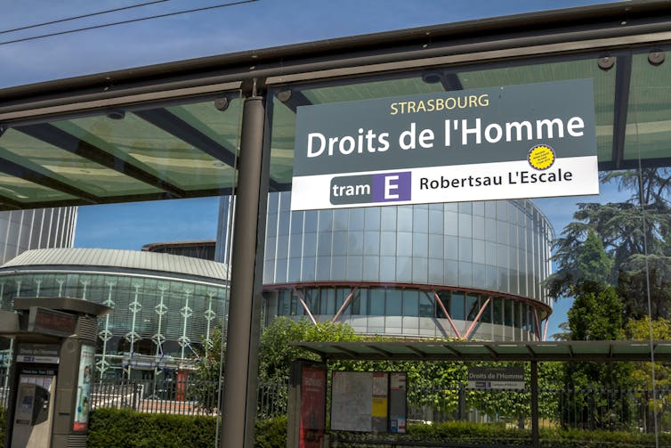 Tram station with sign saying 'Droits de l'Homme'