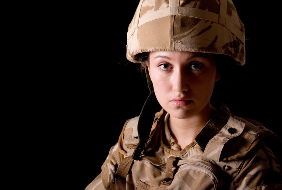 Woman soldier looking into camera