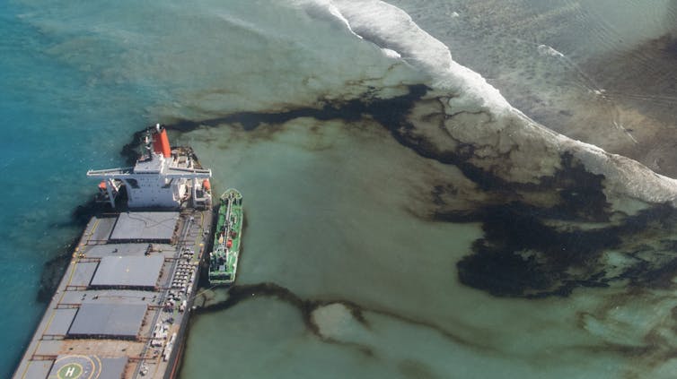 Oil leaks from the MV Wakashio, a Japanese bulk carrier ship that ran aground off the coast of Mauritius in August 2020.