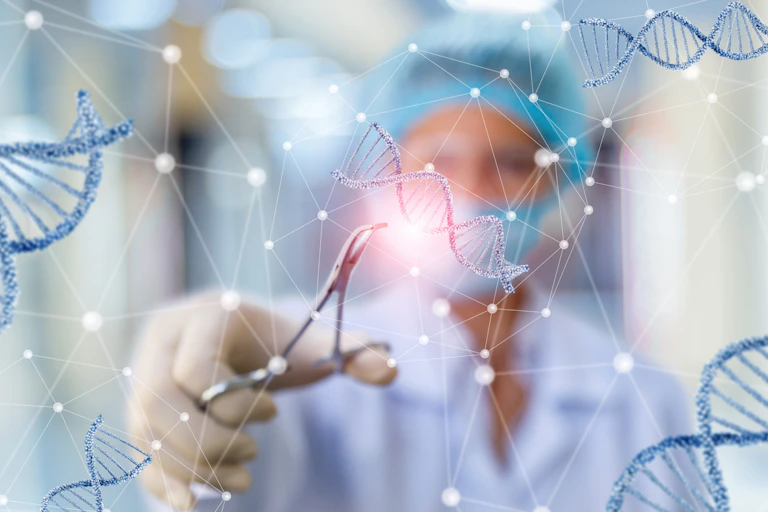 Image of a researcher cutting DNA on blurred background.