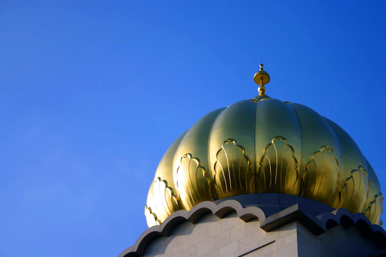 A golden dome of the Sri Guru Singh Sabha Gurdwara in Southhall, west London.