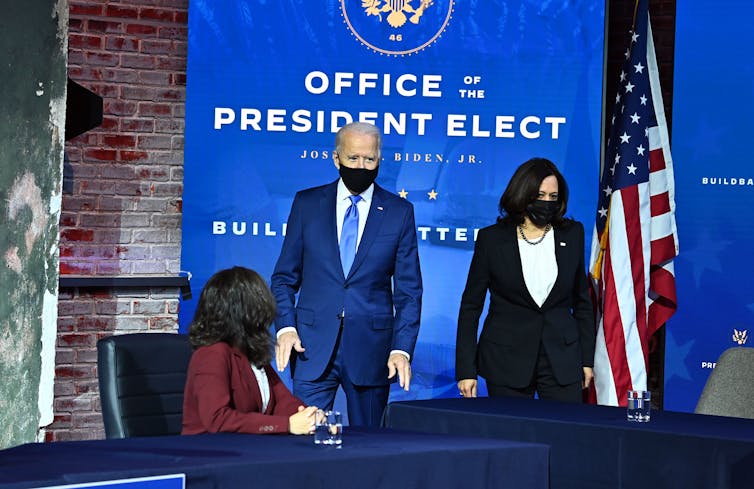 Biden and Harris appearing at an announcement event