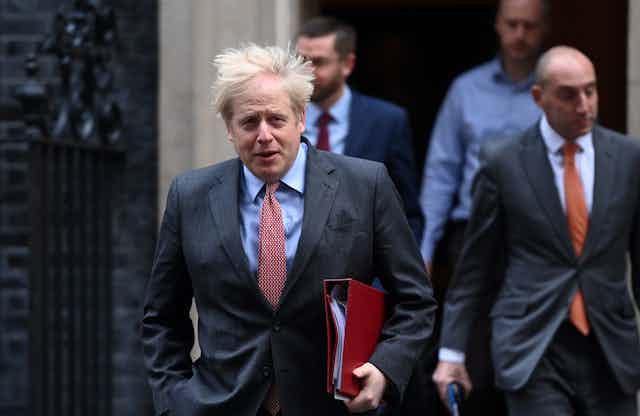 Boris Johnson leaving Downing Street.