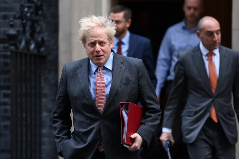 Boris Johnson leaving Downing Street.