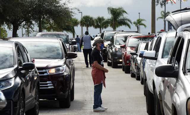 Cars lined up at a food distribution site in Florida.