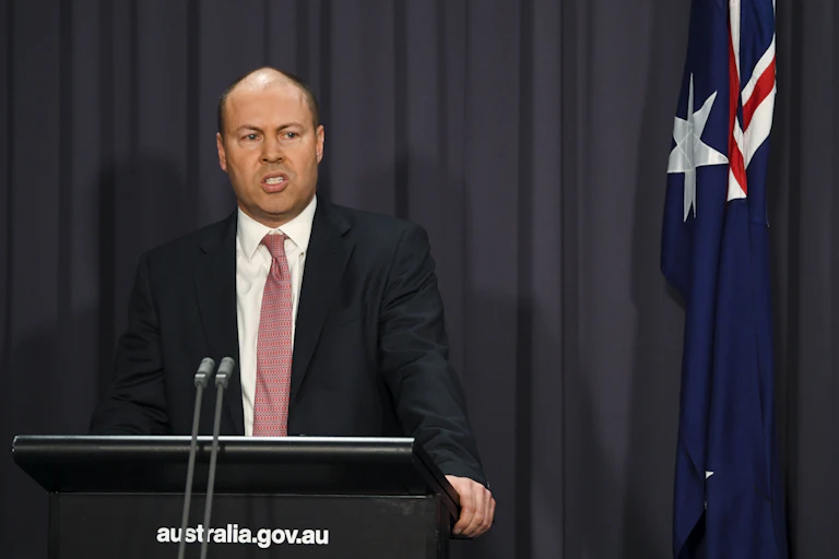 Australian Treasurer Josh Frydenberg speaks to the media during a press conference at Parliament House