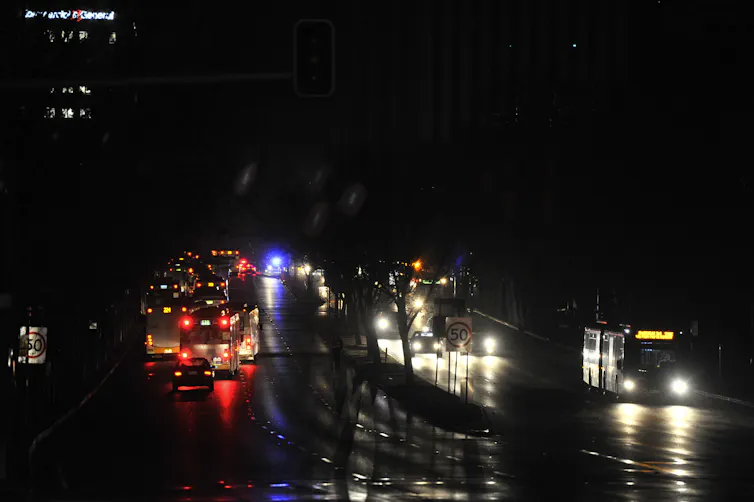 Traffic in total darkness around the Adelaide CBD.