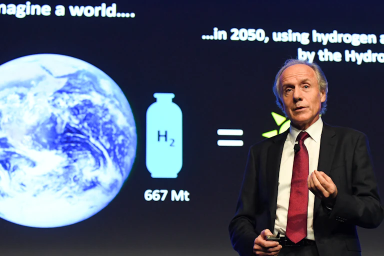 Australia's Chief Scientist Alan Finkel speaking on stage.