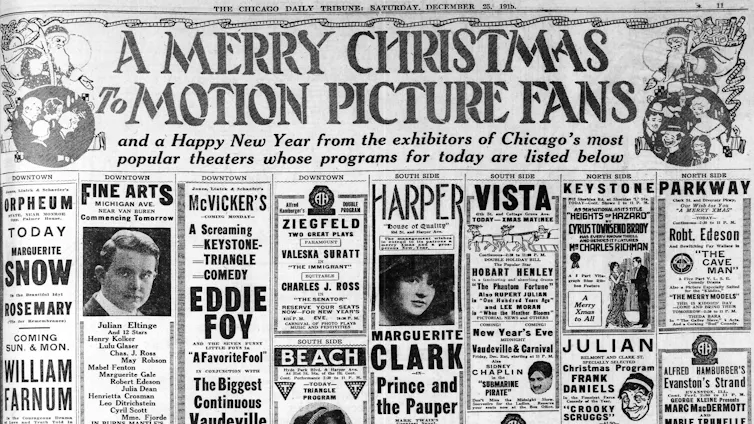 A newspaper showing Christmas ads for movies