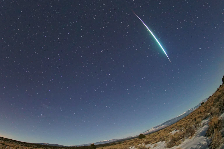 A meteor flash across the sky.