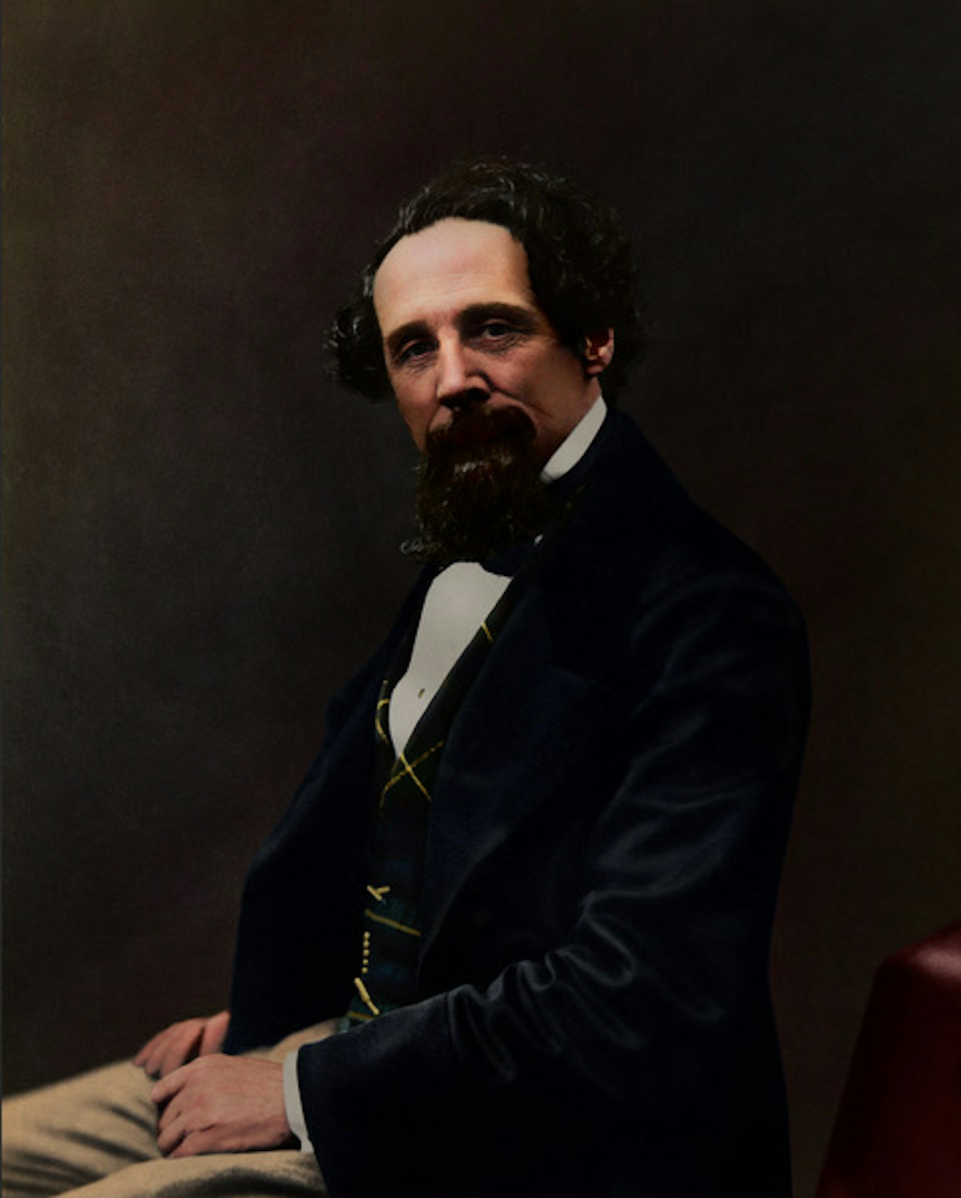 Retrato colorido de Charles Dickens.