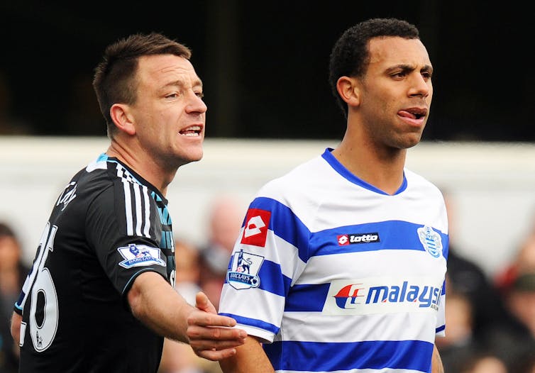 Two footballers from different teams