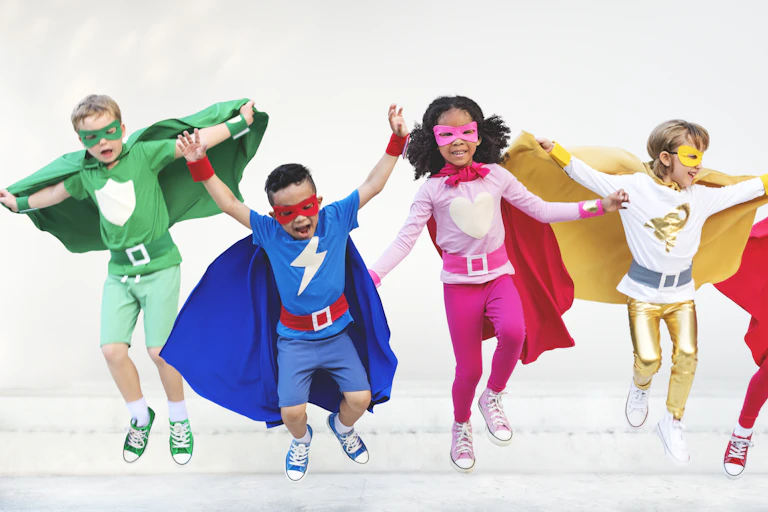 Children dressed as superheroes.