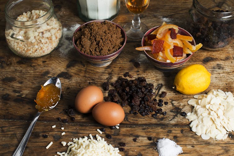Christmas pudding ingredients on an old wooden table