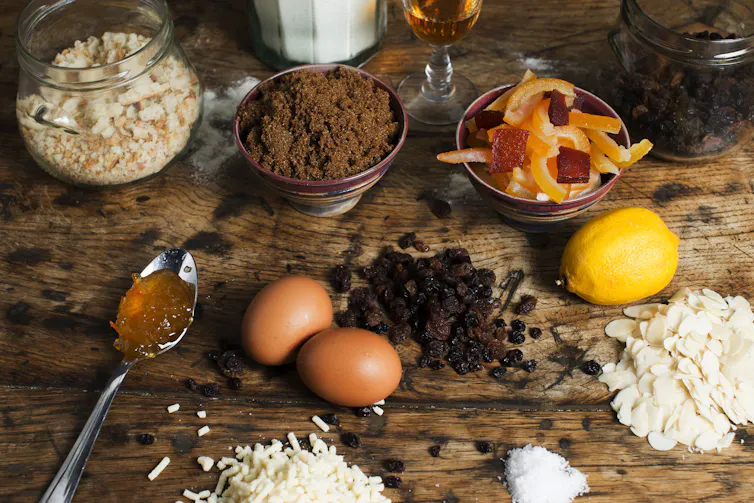 Christmas pudding ingredients on an old wooden table