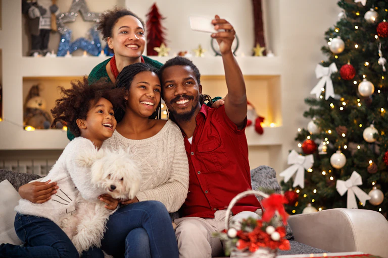 A family taking a Christmas selfie