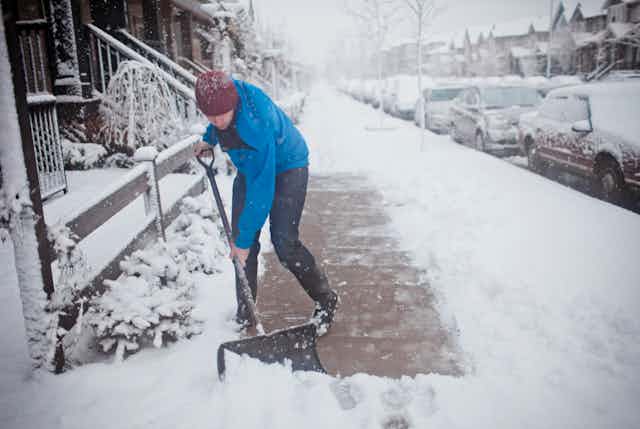 A man shoveling snow.