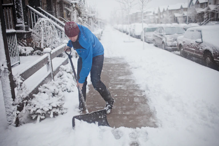A man shoveling snow.