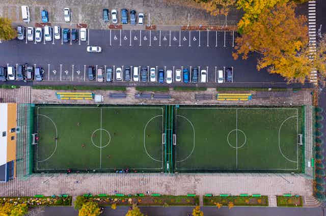 A car park and sports field 