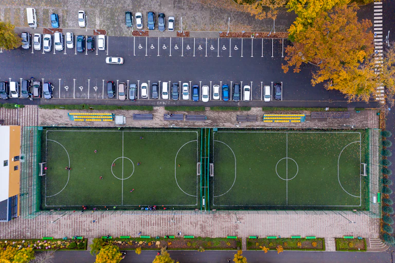 A car park and sports field