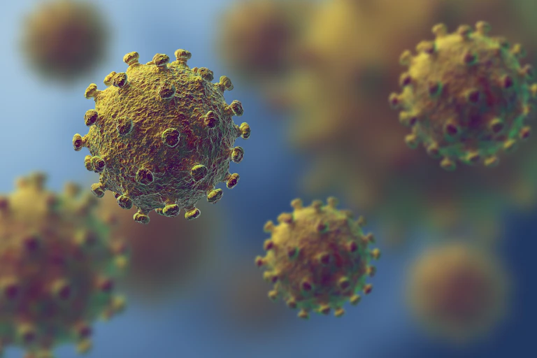 Coronaviruses floating on a blue background