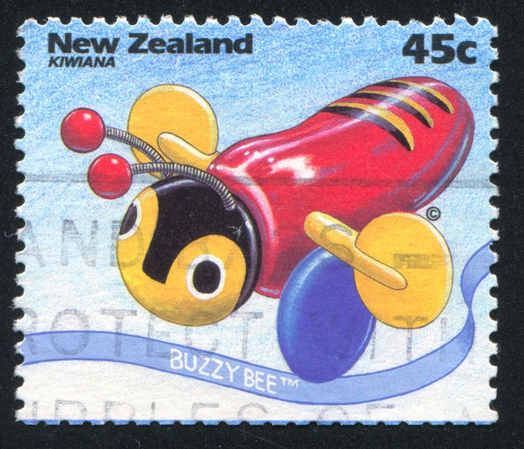 Postage stamp with image of buzzy bee toy
