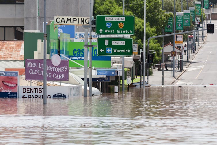 Floodwaters engulf the streets of Ipswich.