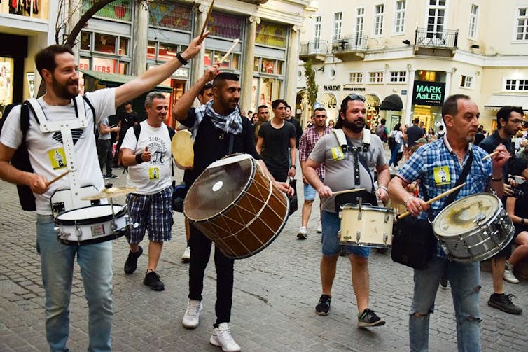 A group of musicians protesting against lack of support for struggling artists in Athens.