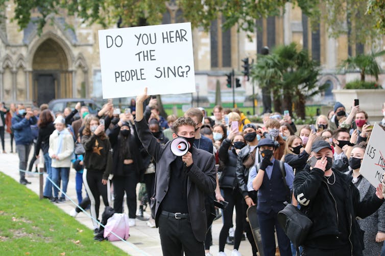 Group of UK musicians protesting outside British parliament against shutdown of music industry due to Covid