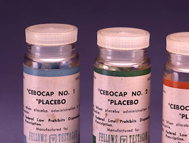 Three bottles containing placebos.