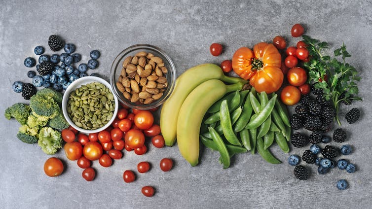 Assorted fruits, vegetables and nuts, artfully arranged