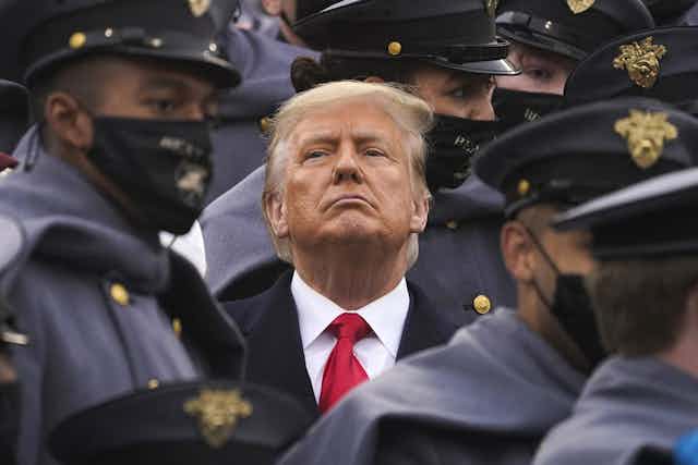 Trump surrounded by army cadets