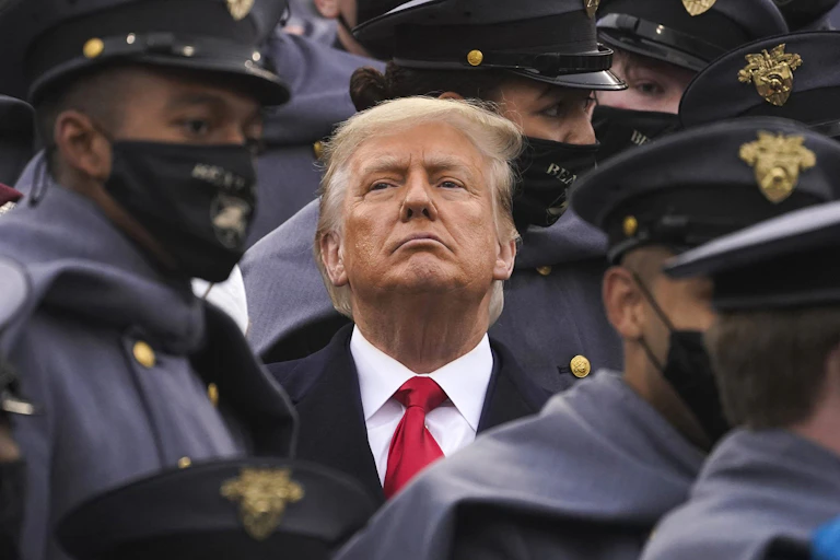 Trump surrounded by army cadets